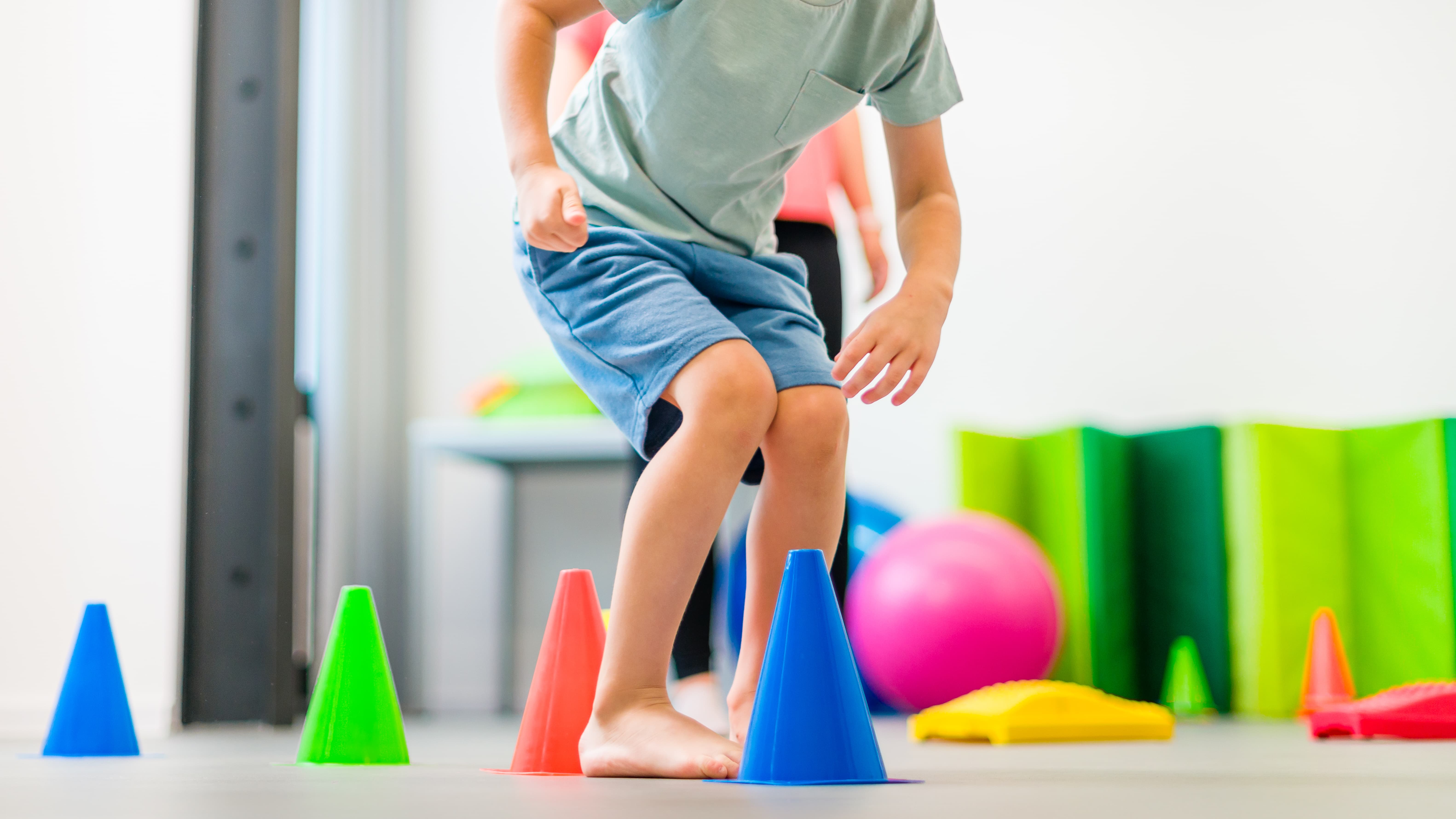 Young boy exercising with